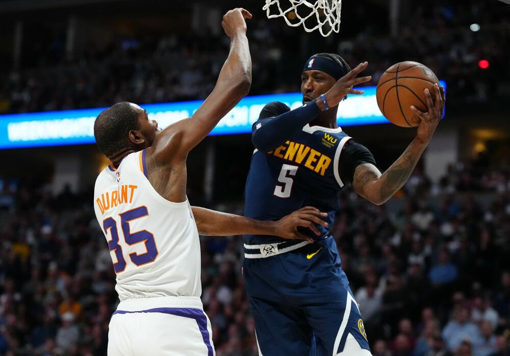 Kentavijus Koldvel-Poup (desno) na utakmici Denver Nagetsa i Finiks Sansa