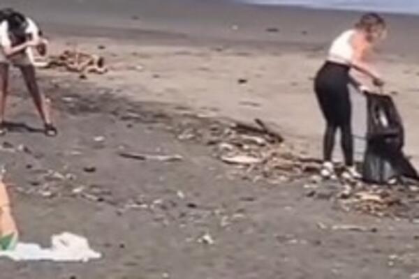 SKUPLJALA SMEĆE DOK JE DRUGARICA FOTKALA, A KAD SE KAMERA UGASILA... Snimak koji je RAZBESENO sve, ima li kraja?!