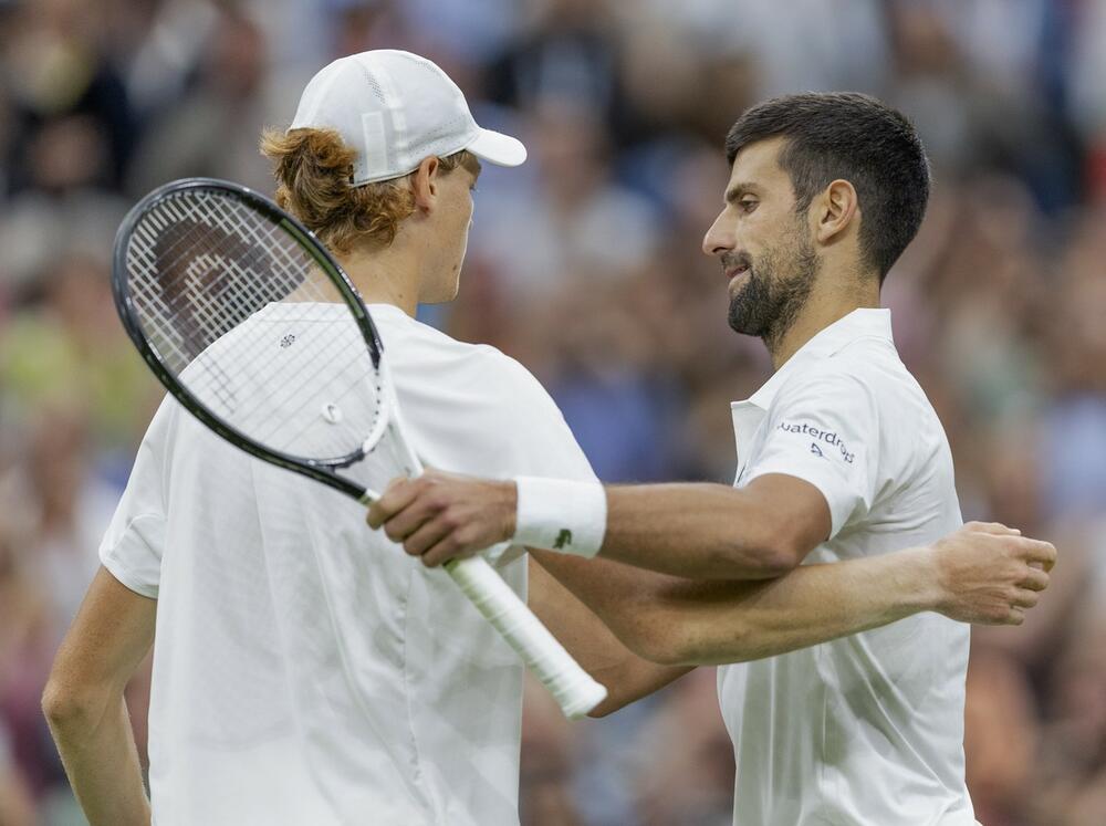 Janik Siner i Novak Đoković