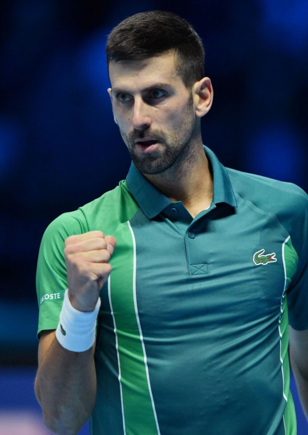 Novak Đoković na meču protiv Holgera Runea