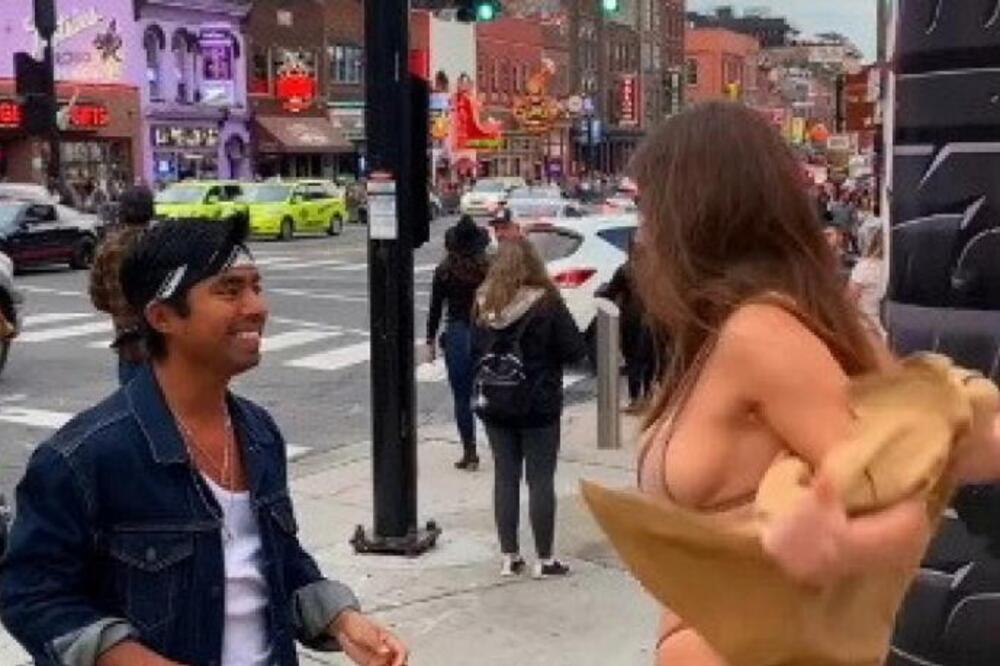 ŠOK! DEVOJKA SE SKINULA NASRED ULICE: Muškarci je gledali BEZ DAHA, a onda je JEDNA ŽENA napravila SKANDAL (VIDEO)