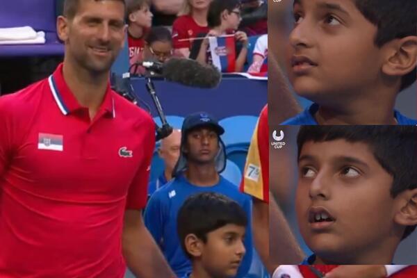 NIJE ZNAO ŠTA GA JE SNAŠLO: Neprocenjivi izrazi lica dečaka kad je shvatio da je Novak Đoković pored njega! (VIDEO)