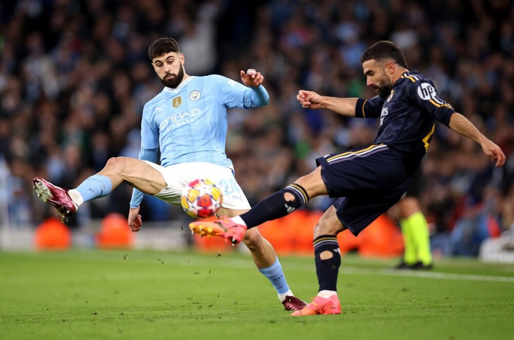 Joško Gvardiol u duelu sa Danijem Karvahalom 