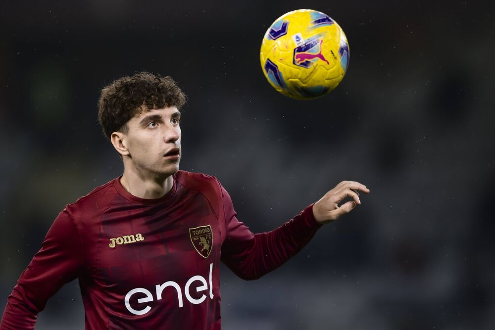 Uroš Kabić na zagrevanju u opremi Torina