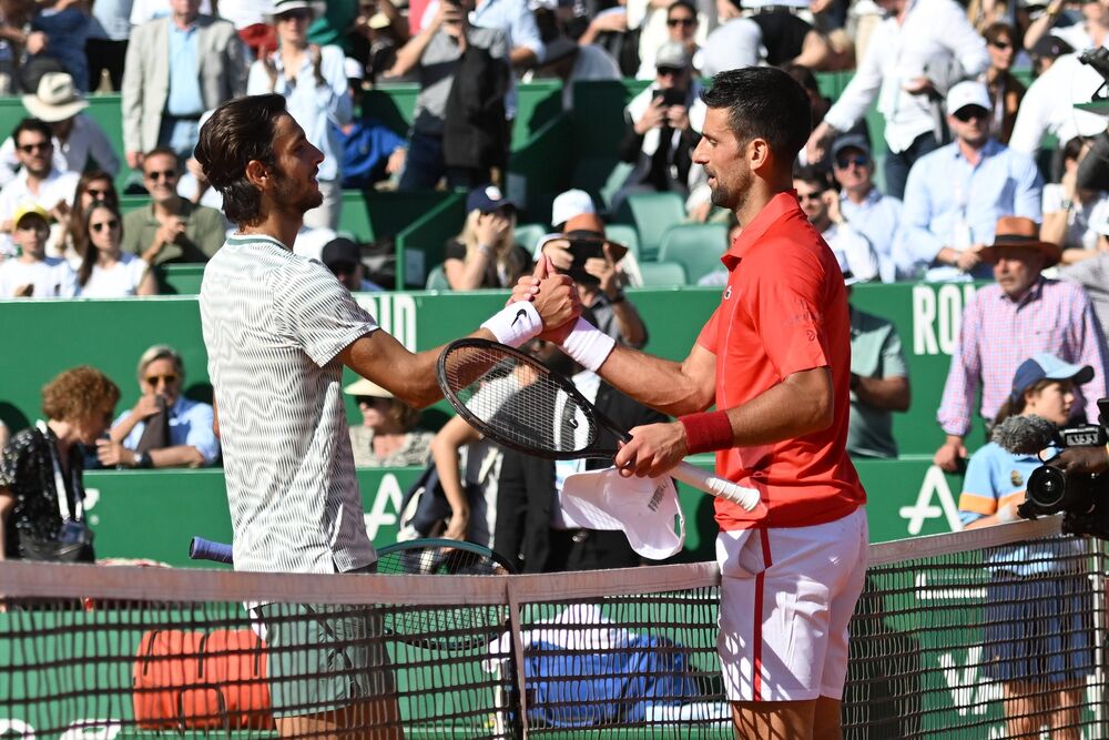 Lorenco Museti i Novak Đoković