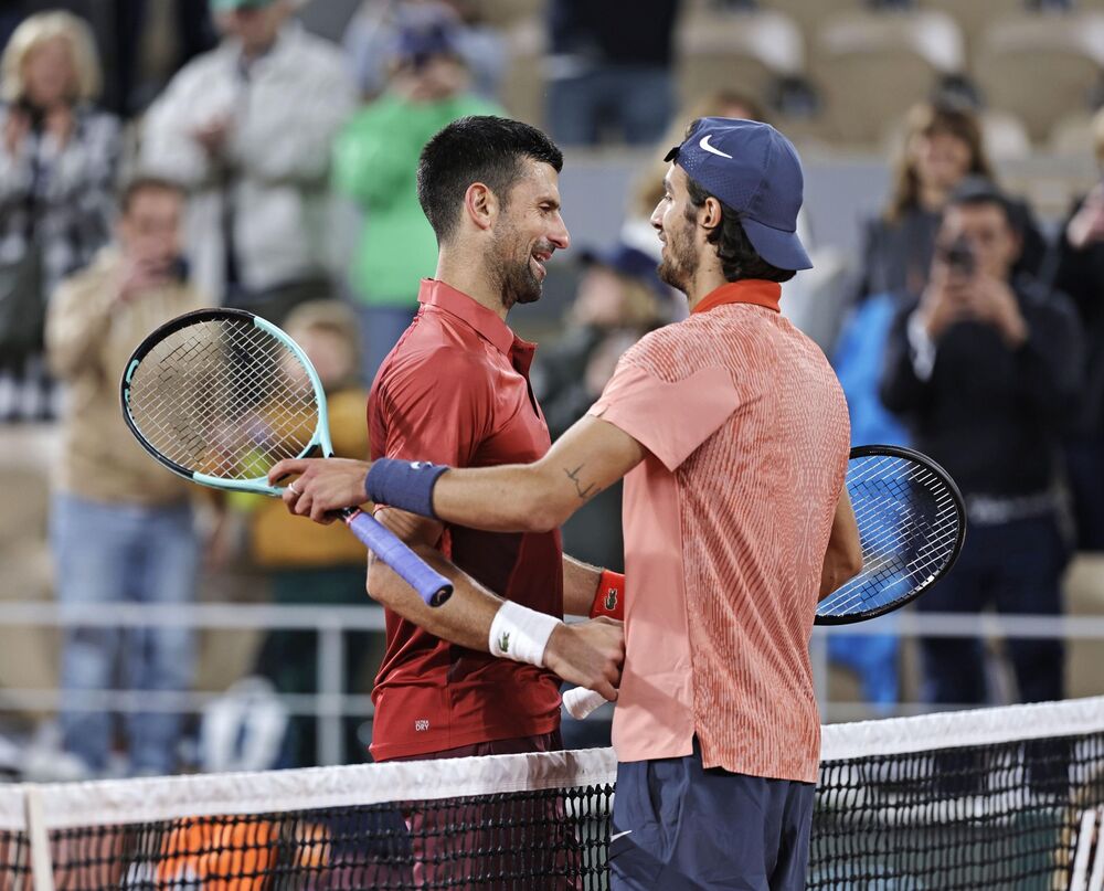 Novak Đoković i Lorenco Museti posle meča