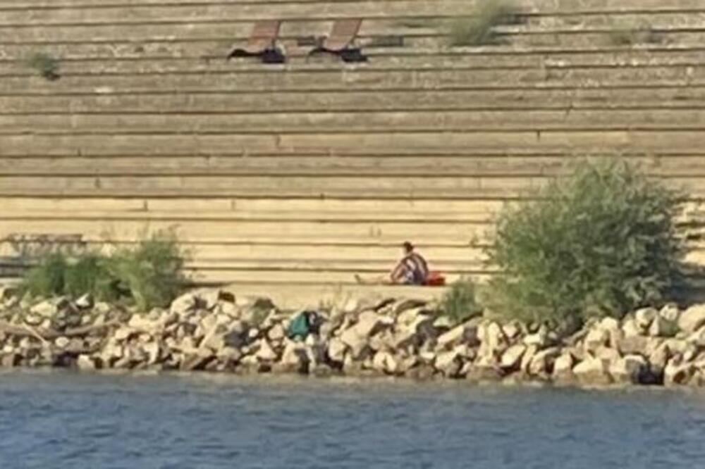 Jeziva scena kao iz horora u Sremskoj Mitrovici: Iz Save izvlače telo žene, a na obali sedi on (FOTO)