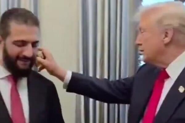 Tramp napravio šou program: Poprskao sirijskog predsednika kolonjskom vodom: "Koliko imaš žena?" (VIDEO)