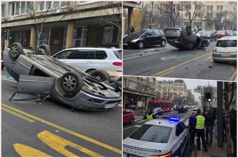 STRAŠNA NESREĆA U CENTRU BEOGRADA! 2 vozila se sudarila, jedno završilo na KROVU, ljudi iz autobusa pešače do posla