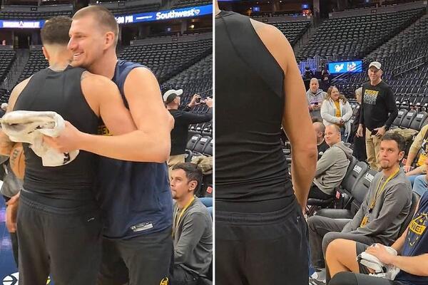 Jokić se izgrlio sa čovekom kog je oterao iz Denvera: Da li prepoznajete igrača koji je sedeo pored? (VIDEO)