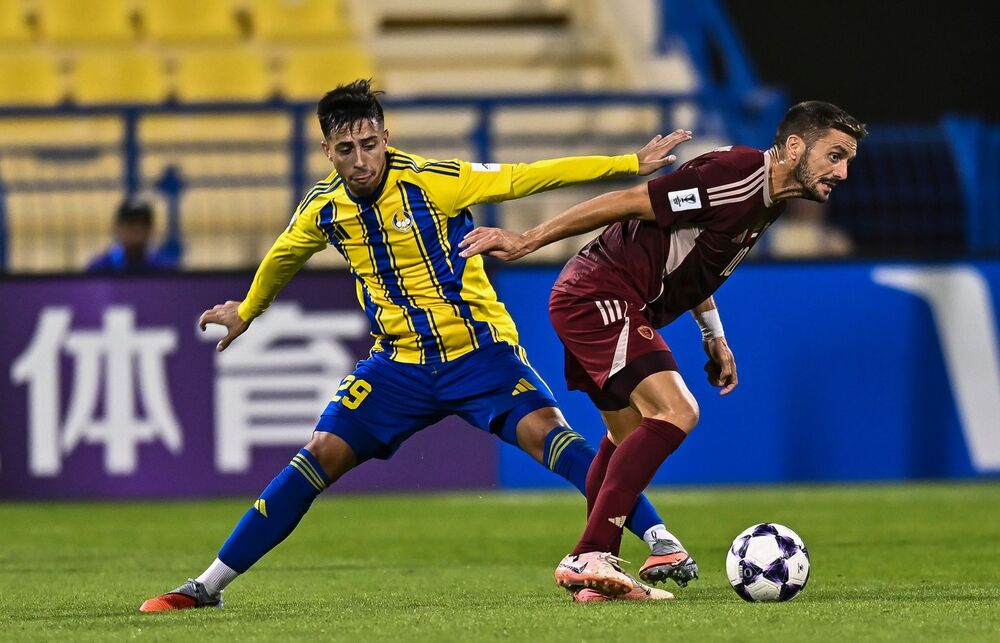 Dušan Tadić (desno) u dresu Al Vahde